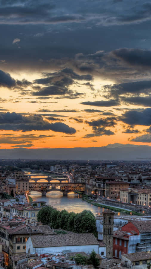 Take In The Beauty Of The City At Sunset Wallpaper