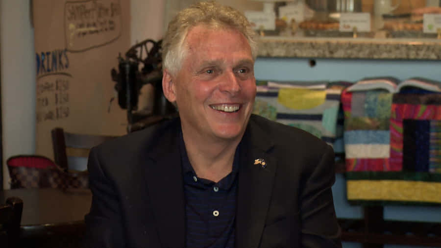 Terry Mcauliffe In A Dark Colored Blazer Wallpaper
