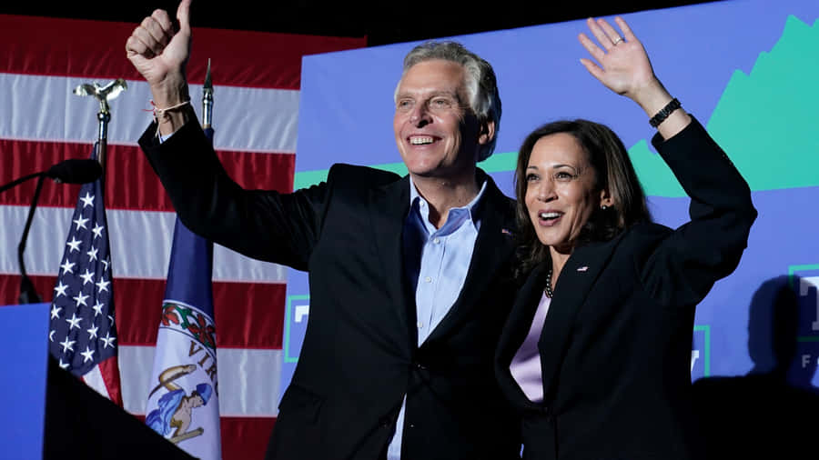 Terry Mcauliffe With Kamala Harris Wallpaper