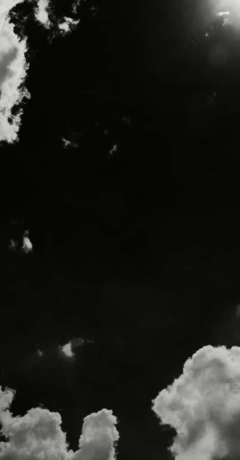 The Artful Beauty Of Black And White Clouds Wallpaper