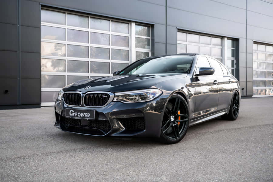 The Bmw M5, A Luxurious High-performance Car. Wallpaper