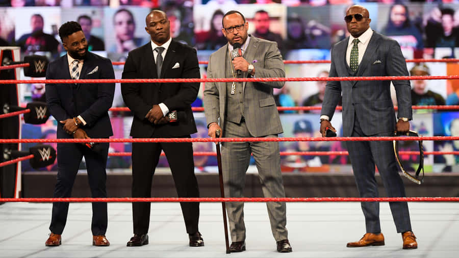 The Hurt Business With Cedric Alexander In Boxing Ring Wallpaper