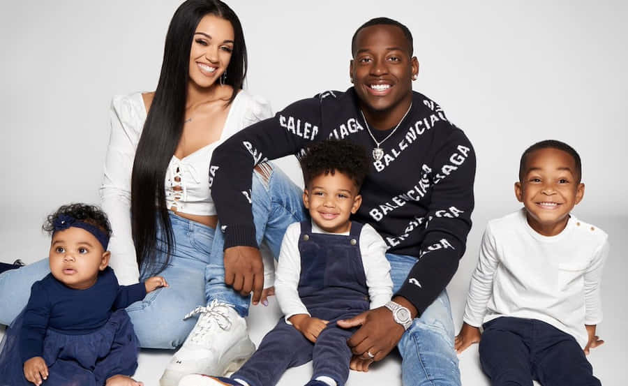 The Prince Family - Bonding Together Through Generations Wallpaper