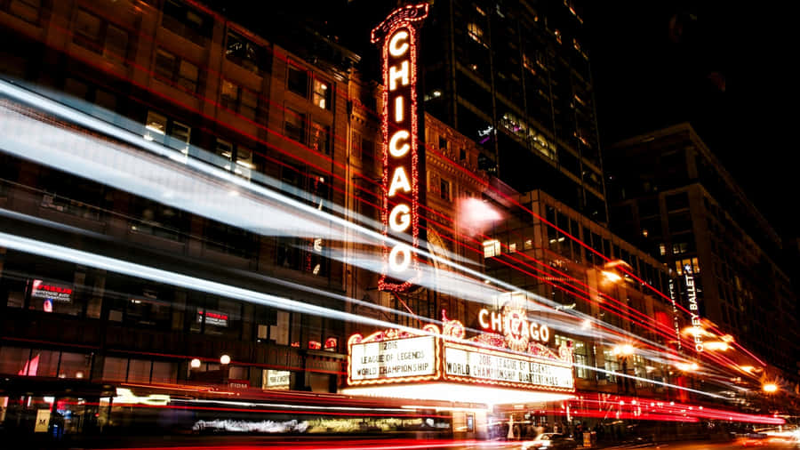 The Spectacular Skyline Of Chicago At Night Wallpaper
