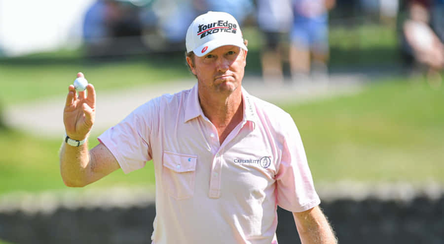 Tim Petrovic Holding The Golf Ball Wallpaper