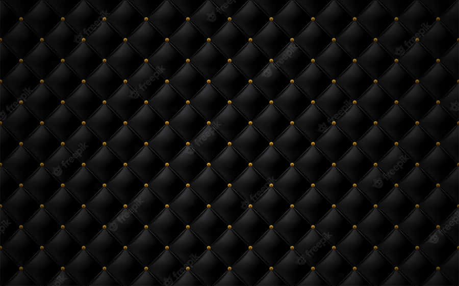 Timeless And Luxurious Black Leather. Wallpaper