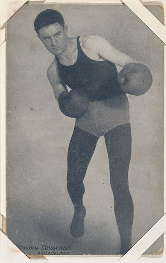 Tommy Loughran In Punching Pose Wallpaper