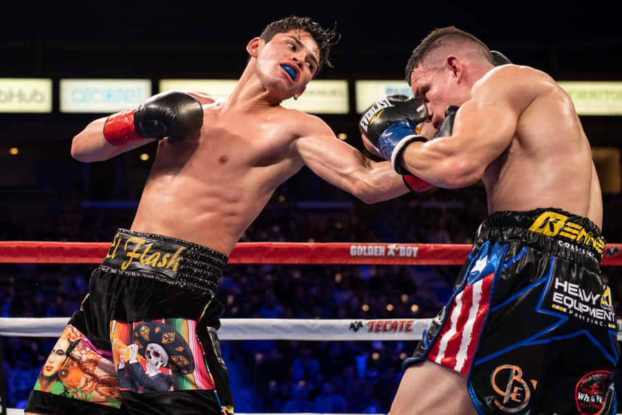 Two Boxers In A Boxing Ring Fighting Wallpaper
