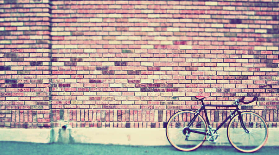 Vintage Desktop Bicycle On Brick Wall Wallpaper