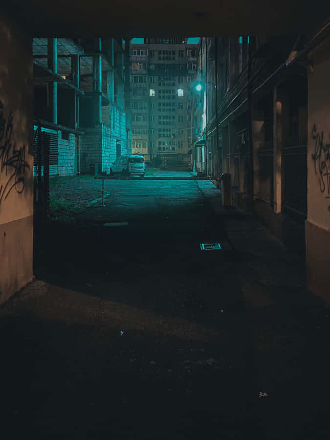 Walking Through A Challeging City Alleyway Wallpaper