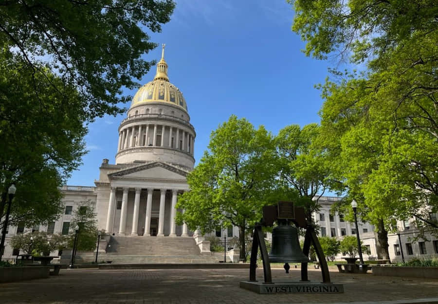 West Virginia And The State's Huge Bell At Its Capitol Building Wallpaper