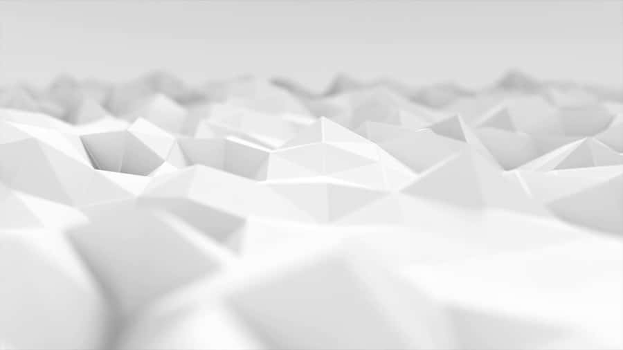 White Triangles In A White Background Wallpaper