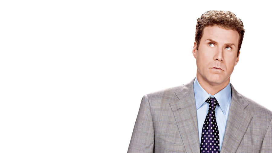 Will Ferrell Striking A Cool Pose Wearing A Blue Suit And Tie Wallpaper