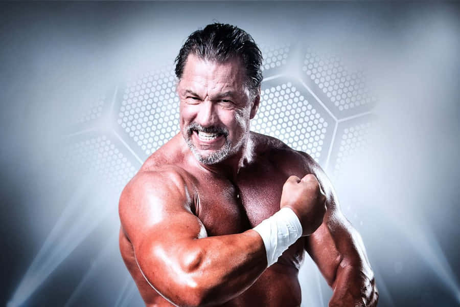 Wrestler Showing Off Muscles Wallpaper