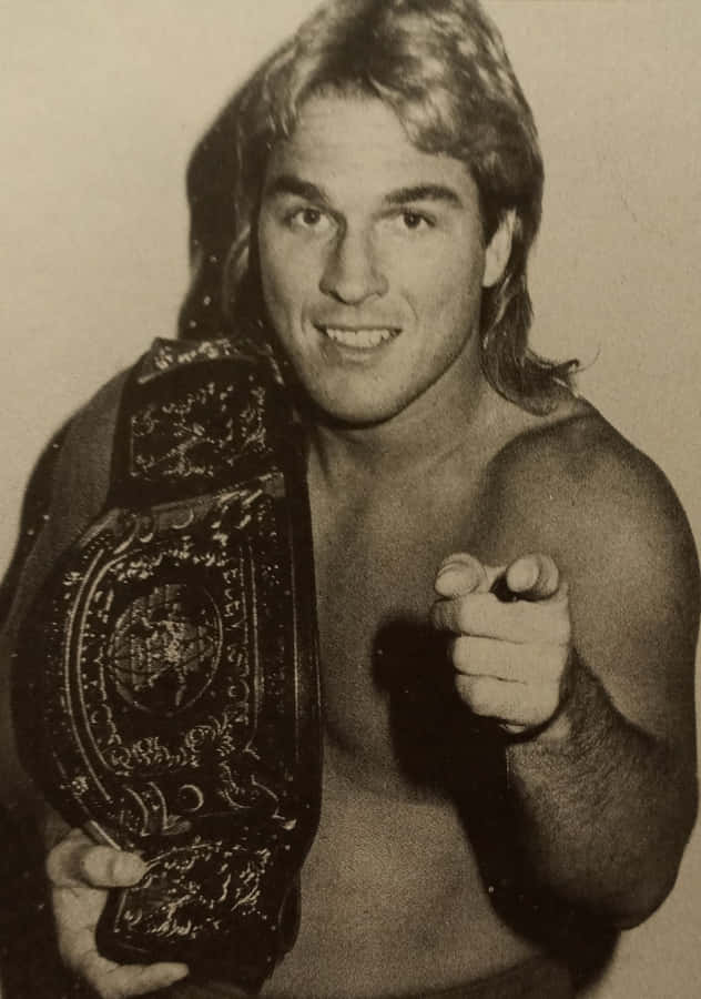 Wrestler With Championship Belt Wallpaper