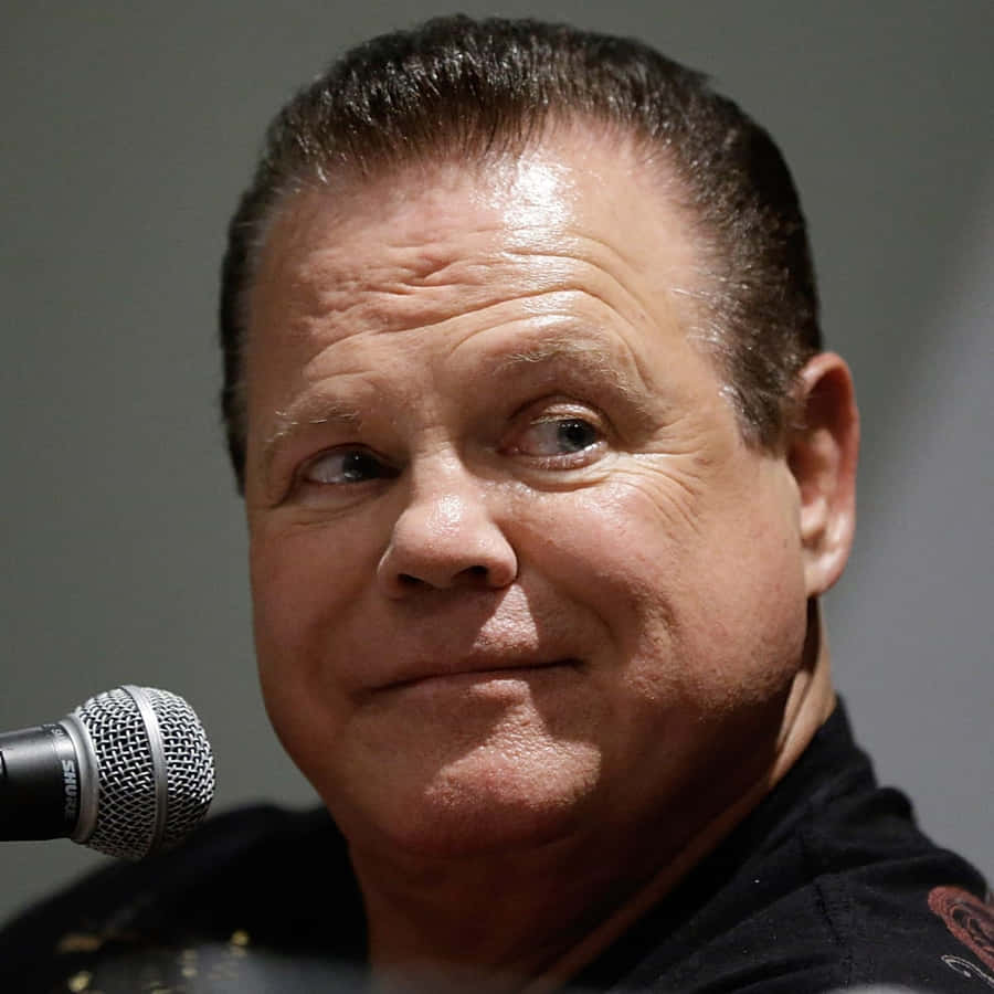 Wrestling Legend Jerry Lawler In Action Wallpaper