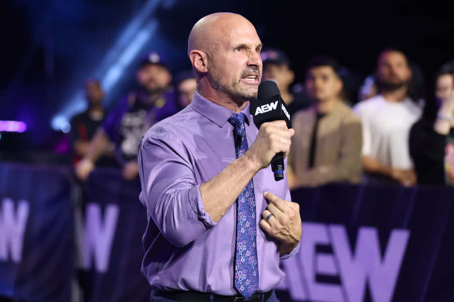 Wrestling Promoter Speakingat A E W Event Wallpaper