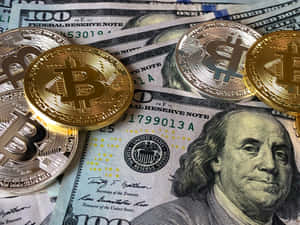 100 Dollar Bill Pile With Bitcoin Coins Wallpaper