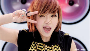 2ne1's Minzy Strikes A Peace Sign Wallpaper