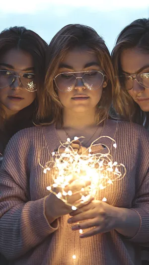 3 Best Friends With Fairy Lights Wallpaper