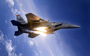 3 Navy Fighter Jets Forming A Thunderous Sky – A Spectacle To Behold Wallpaper