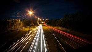 4k Computer Car Lights On Road Wallpaper