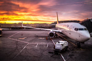 4k Plane Loading In Tarmac Wallpaper