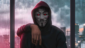 64k Ultra Hd Hacker Sitting Down With Mask Wallpaper