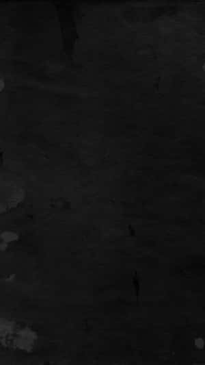 A Black And White Background With A Black And White Splatter Wallpaper