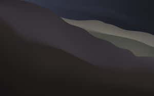 A Black And White Image Of A Mountain Wallpaper