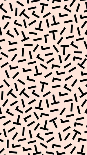A Black And White Pattern With Black And White Shapes Wallpaper