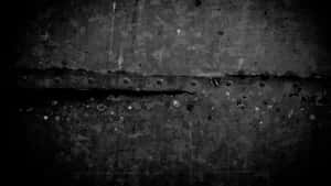 A Black And White Photo Of A Metal Wall Wallpaper