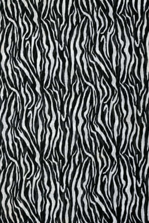 A Black And White Zebra Print Fabric Wallpaper