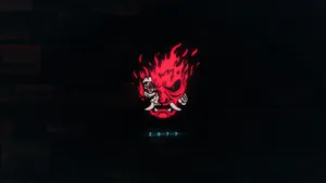 A Black Background With A Red Logo On It Wallpaper