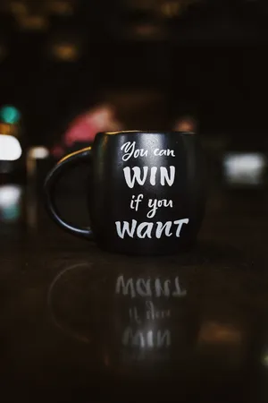 A Black Coffee Mug With The Words You Win It You Want Wallpaper