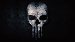 A Black Skull With Menacing Red Eyes. Wallpaper