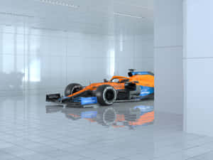 A Blue And Orange Racing Car Is Sitting In A Room Wallpaper