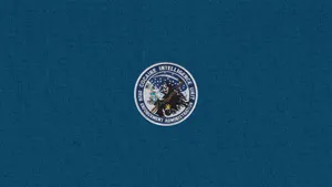 A Blue Background With A Seal On It Wallpaper