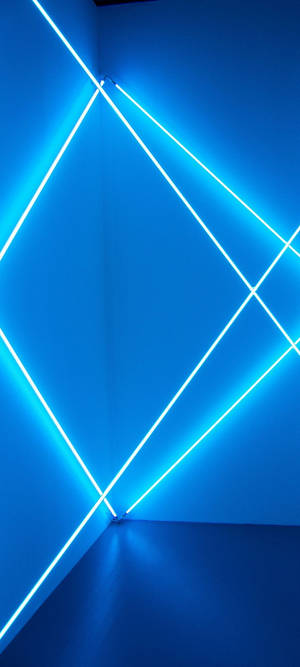 A Blue Neon Wall With A Blue Light Wallpaper