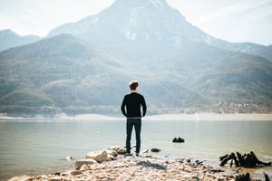 A Boy Finding His Inner Calm In Nature Wallpaper