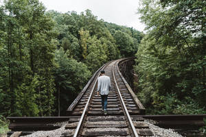 A Boy Relaxing In Nature Wallpaper