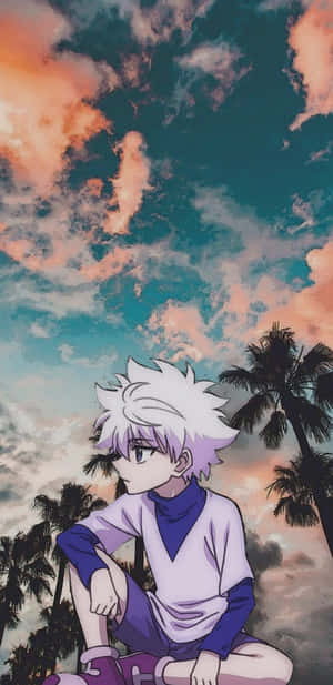 A Boy Sitting On The Ground With A Palm Tree In The Background Wallpaper