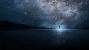 A Breathtaking View Of A Starry Night Sky. Wallpaper