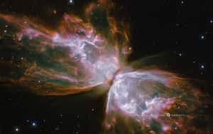 A Breathtaking View Of Space And The Majestic Colors In The Night Sky, Captured By The Hubble Telescope Wallpaper