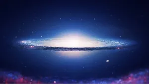 A Breathtaking View Of The Darkness Of Outer Space And A Spiral Galaxy Surrounded By Stars Wallpaper