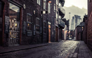 A Brick Street With A Sign Wallpaper