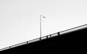 A Bridge With A Light Pole Wallpaper