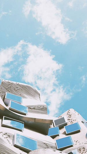 A Building With Windows And A Clock Wallpaper