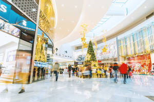 A Bustling Shopping Center Atmosphere At Its Peak. Wallpaper