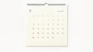 A Calendar With A White Background And A Red Number Wallpaper